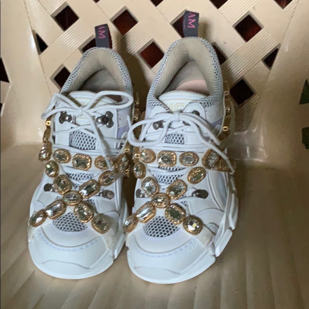 This is a Gucci flashtrek sneakers with straps